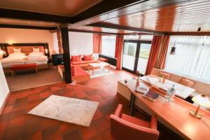 Postel nebo postele na pokoji v ubytování Hotel Wiehen-Therme