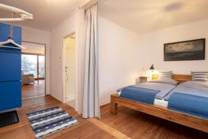 Posteľ alebo postele v izbe v ubytovaní Frauscher Hafen-Apartments