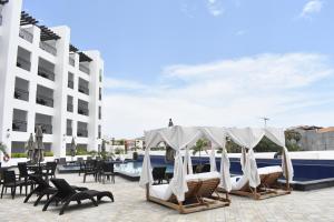Bazén v ubytování Medano Hotel and Spa nebo v jeho okolí