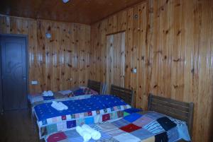 Voodi või voodid majutusasutuse Keti Pilpani Guesthouse toas