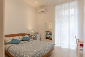 Postel nebo postele na pokoji v ubytování Bed & Breakfast "Il Priscio"