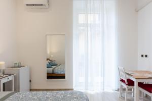 Katil atau katil-katil dalam bilik di Bed & Breakfast "Il Priscio"