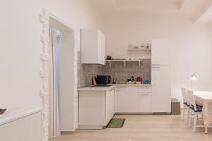 Kuchyň nebo kuchyňský kout v ubytování Bed & Breakfast "Il Priscio"
