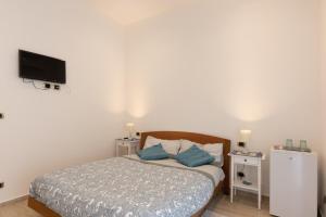 Postel nebo postele na pokoji v ubytování Bed & Breakfast "Il Priscio"