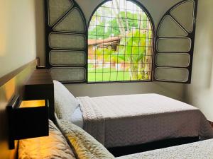 Letto o letti in una camera di Hostel SLG