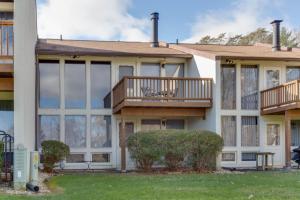 a house with large windows and a balcony at Stony Court by Coolvacay in Basye