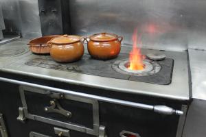 Kuhinja oz. manjša kuhinja v nastanitvi Hotel Rural Jaumet