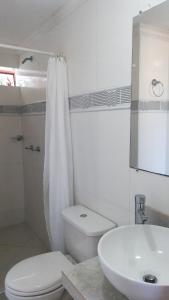 Vonios kambarys apgyvendinimo įstaigoje Apartamentos Osma