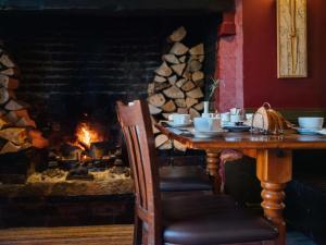 Ресторант или друго място за хранене в The Bell Inn