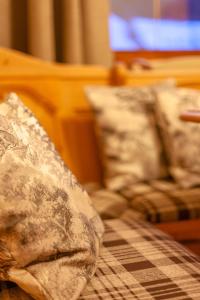 Postel nebo postele na pokoji v ubytování Das Landhaus Apartments Prägant