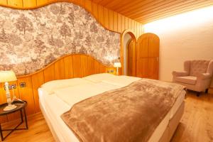 Postel nebo postele na pokoji v ubytování Das Landhaus Apartments Prägant