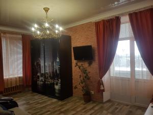 Μια τηλεόραση ή/και κέντρο ψυχαγωγίας στο Apartment New York Street