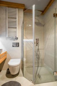 Kúpeľňa v ubytovaní Apartament Skrzyczne