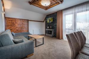 A seating area at Apartmany Krasvill