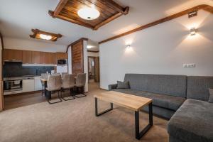 A kitchen or kitchenette at Apartmany Krasvill