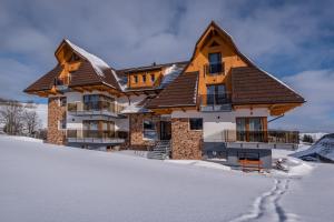 Apartmany Krasvill during the winter