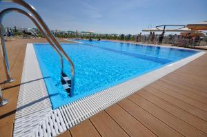 a swimming pool on top of a building at Hotel Garden in Riccione