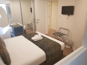 Quest on Durham客房内的一张或多张床位