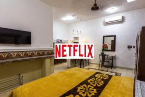 TV a/nebo společenská místnost v ubytování Merida Serviced Apartments