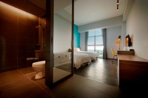 Postel nebo postele na pokoji v ubytování KIP Hotel