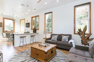 a living room with a couch and a table at Culver city ·4045 Jackson in Los Angeles