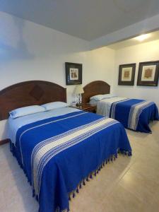 Cama o camas de una habitación en Casa Teotitlán