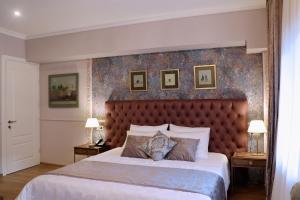 Letto o letti in una camera di Omart Hotel - Gallery