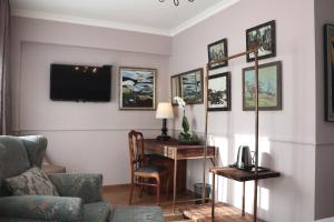 TV o dispositivi per l'intrattenimento presso Omart Hotel - Gallery