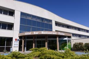 an external view of a hotel bar restaurant building at Best Western Plus Hotel Admiral in La Tour-de-Salvagny