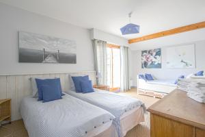 Cama ou camas em um quarto em Les Costils