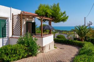 a villa with a view of the ocean at Villaggio Passo Dell'Arciprete in Vieste