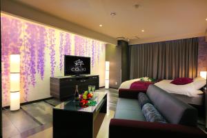 Postel nebo postele na pokoji v ubytování HOTEL 小粋 -coiki-