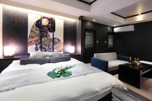 Postelja oz. postelje v sobi nastanitve HOTEL 小粋 -coiki-
