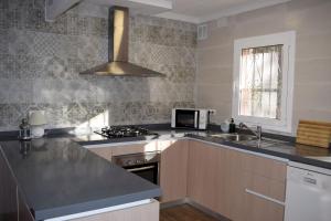 Η κουζίνα ή μικρή κουζίνα στο Villa Font