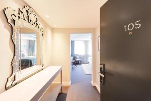 Postel nebo postele na pokoji v ubytování Hotel Admiral