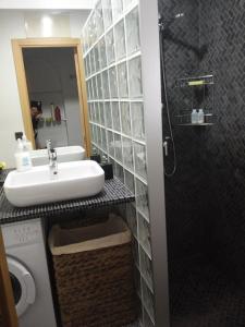 Kúpeľňa v ubytovaní Precioso duplex con piscina