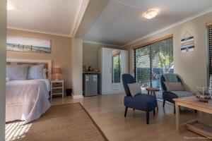 Ένα ή περισσότερα κρεβάτια σε δωμάτιο στο Atlantic Bay Lodge +58 φωτογραφίες