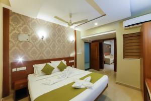 Cama o camas de una habitación en Sreepathi Indraprastha