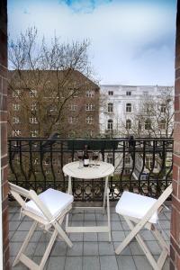 En balkon eller terrasse på Hotel Fresena im Dammtorpalais