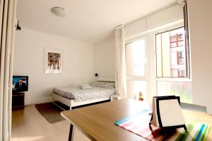 Postel nebo postele na pokoji v ubytování Interno 77 di TSS' - Appartamento soleggiato con Ampie Finestre & Internet Veloce con Fibra - Perfetto per Coppie