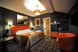 Ένα ή περισσότερα κρεβάτια σε δωμάτιο στο The Pilot Inn