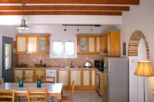 Kuchyň nebo kuchyňský kout v ubytování Panorama Villas + 33 fotografií