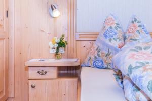 Łóżko lub łóżka w pokoju w obiekcie Stabentheiner-Hof