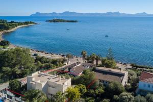 an aerial view of a beach and a body of water at Vistafar - Private Pool & Only 50m to the Sea in Alcudia