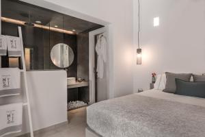 Postel nebo postele na pokoji v ubytování Myst Boutique Hotel