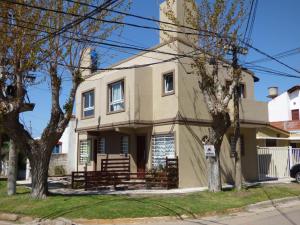 a house on the corner of a street at Maraja1 in Mar de Ajó
