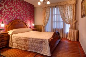 Postel nebo postele na pokoji v ubytování Casa Rural Villa Gervasio