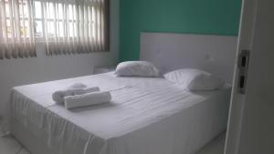 Cama o camas de una habitación en RAFAELLO HOTEL