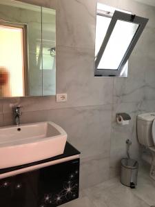 Koupelna v ubytování Hotel EDEA