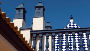 a building with two towers on top of it at Leo San Bruno in Isla Canela
